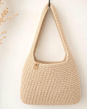 Beige handgehäkelte Schultertasche aus Baumwolle mit strukturierter Oberfläche und langem Träger